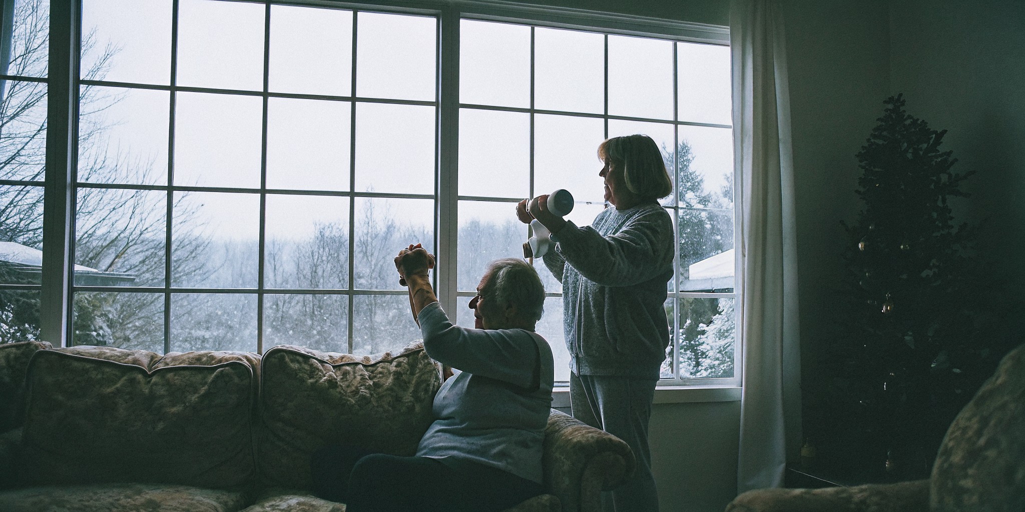 Home caregiver supporting a senior with gentle exercise in their Castle Rock home