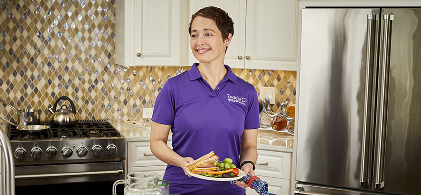 Caregiver preparing a meal